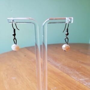 NWOT earrings, dangling, white/amber colored stone
